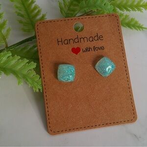 Blue glitter resin stud earrings